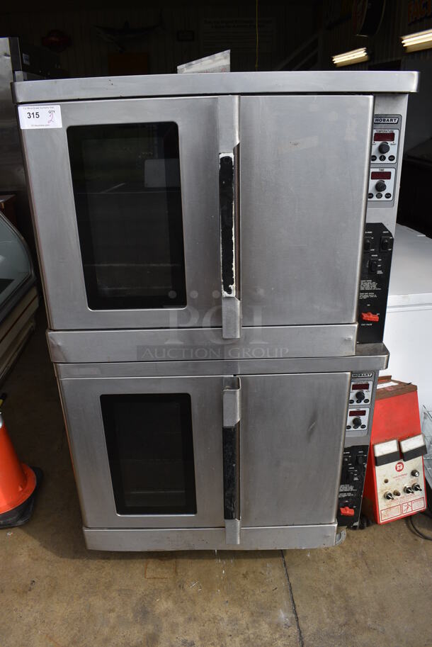 2 Hobart Stainless Steel Commercial Natural Gas Powered Full Size Convection Ovens w/ View Through Doors, Metal Oven Racks on Commercial Casters. 38x37x66. 2 Times Your Bid!