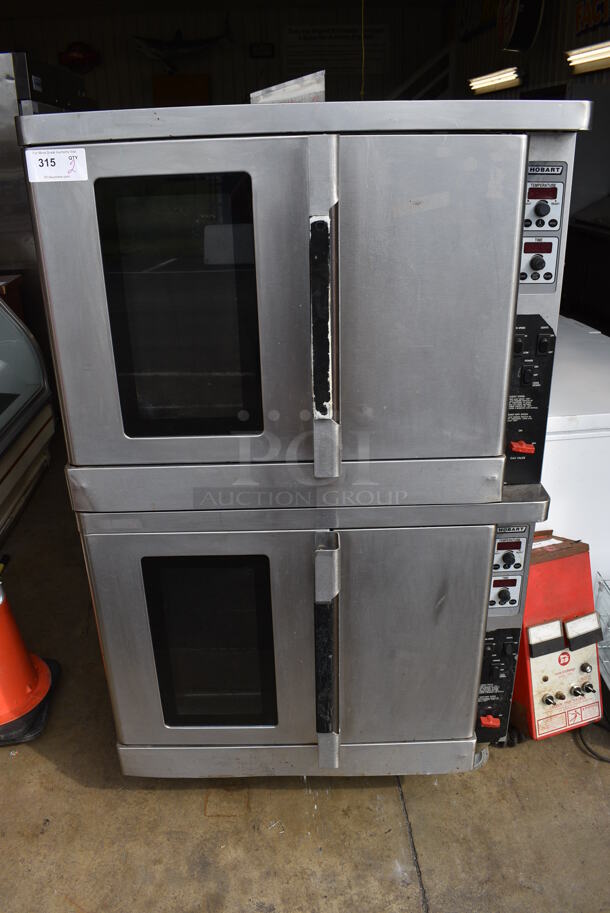 2 Hobart Stainless Steel Commercial Natural Gas Powered Full Size Convection Ovens w/ View Through Doors, Metal Oven Racks on Commercial Casters. 38x37x66. 2 Times Your Bid! - Image 1 of 7
