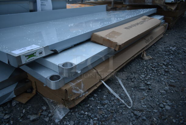BRAND NEW SCRATCH AND DENT! Regency 600TB3072G 30" x 72" 18-Gauge 304 Stainless Steel Commercial Work Table with 4" Backsplash and Galvanized Undershelf - Image 5 of 6