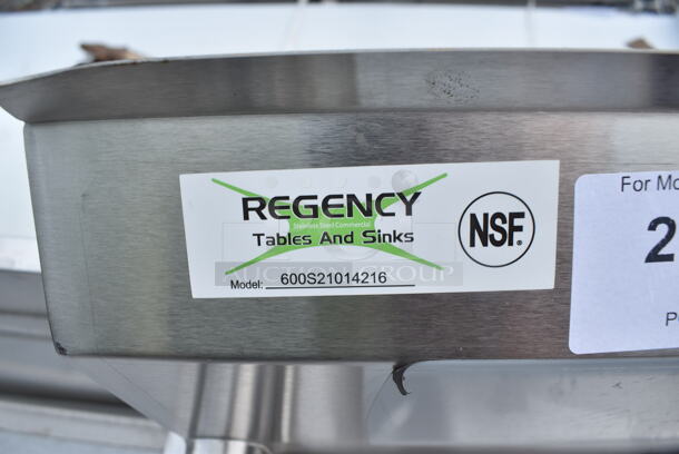 BRAND NEW SCRATCH AND DENT! Regency 600S21014216 54" 16-Gauge Stainless Steel Two Compartment Commercial Sink with Galvanized Steel Legs and Two Drainboards - 10" x 14" x 12" Bowls. No Legs.  - Image 9 of 9