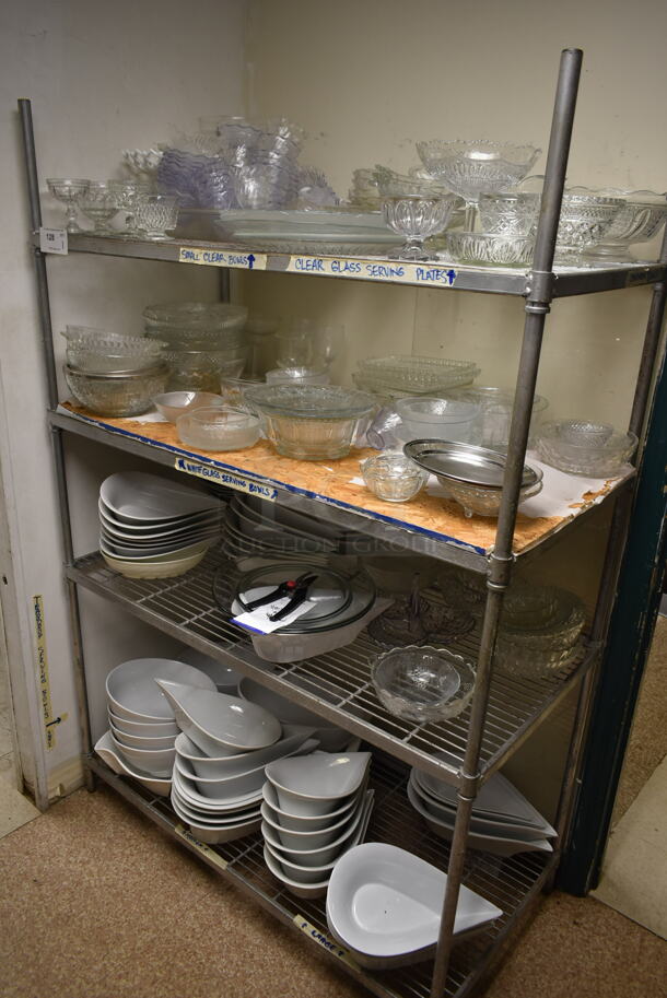 Metal Wire 4 Tier Shelving Unit w/ Contents Including Ceramic Bowls. BUYER MUST REMOVE: BUYER MUST DISMANTLE. PCI CANNOT DISMANTLE FOR SHIPPING. PLEASE CONSIDER FREIGHT CHARGES. (dish room) - Image 1 of 5