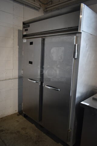 2018 Continental 2F Stainless Steel Commercial 2 Door Reach In Freezer w/ Poly Coated Racks on Commercial Casters. 115 Volts, 1 Phase. Tested and Working!