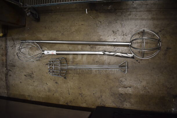 3 Various Metal Items; 2 Whisks and 1 Basket. Includes 8.5x8.5x47. 3 Times Your Bid!
