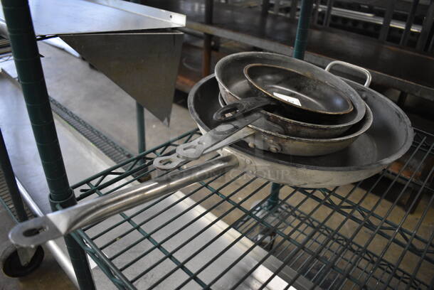 4 Various Metal Skillets. Includes 28x15.5x2. 4 Times Your Bid! - Image 1 of 3