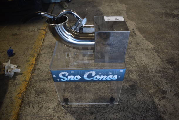 BRAND NEW! 2022 Carnival King 382SCM250 Stainless Steel Commercial Countertop Sno Cone Ice Shaver on Poly Clear Bin. 120 Volts, 1 Phase. Tested and Working!