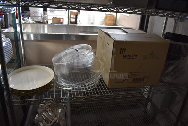 ALL ONE MONEY! Lot of Chrome Finish 5 Tier Shelving Unit w/ Contents Including Poly Cake Stand Covers, Mesh Bins, Metal Buckets, Stainless Steel Drop In Bins, Wooden Boxes and Silverware. BUYER MUST DISMANTLE. PCI CANNOT DISMANTLE FOR SHIPPING. PLEASE CONSIDER FREIGHT CHARGES. 49x18x77 - Image 3 of 12