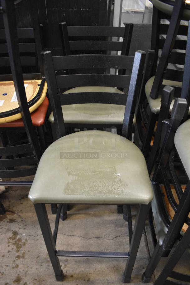 2 Black Metal Bar Height Chairs w/ Green Seat Cushions. 17x18x44. 2 Times Your Bid! - Image 1 of 3