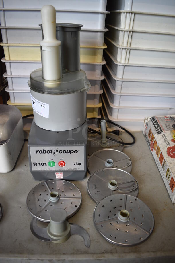 Robot Coupe Model R 101 Metal Commercial Countertop Food Processor w/ Bowl, Lid, Pusher, S Blade, 2 Grating Blades and 3 Slicing Blades. 120 Volts, 1 Phase. 8x11x21. Tested and Working!