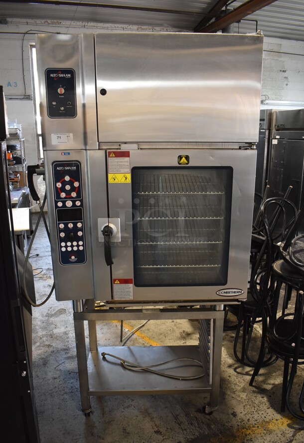 2013 Alto Shaam 10.10 ESVH Stainless Steel Commercial Electric Powered Combi Convection Oven w/ Ventless Hood and Equipment Stand on Commercial Casters. 208-240 Volts, 3 Phase.