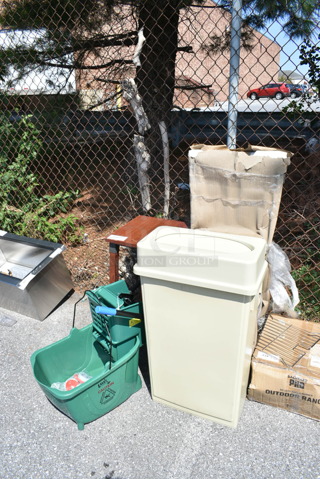 4 BRAND NEW SCRATCH AND DENT! Items Including 475WH23BG Lavex 23 Gallon Beige Slim Trash Can, 164VYBARSTES Lancaster Table & Seating Vineyard Series Whiskey Brown Wood Outdoor Cross Back Bar Stool, Lavex Green Mop Bucket, Wood Pattern Stool. 4 Times Your Bid! 