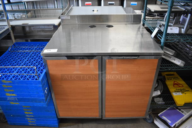 Duke Model SUB-P-36M Stainless Steel Commercial Counter w/ 2 Wood Pattern Doors and Backsplash. 36x30x40