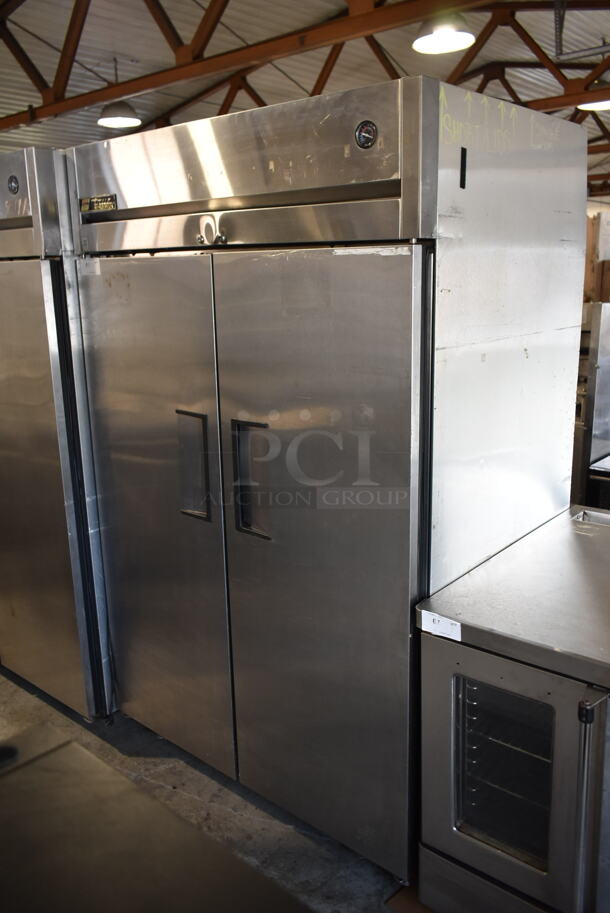 2013 True TG2R-2S ENERGY STAR Stainless Steel Commercial 2 Door Reach In Cooler w/ Poly Coated Racks on Commercial Casters. 115 Volts, 1 Phase. Tested and Working! - Image 1 of 8