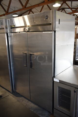 2013 True TG2R-2S ENERGY STAR Stainless Steel Commercial 2 Door Reach In Cooler w/ Poly Coated Racks on Commercial Casters. 115 Volts, 1 Phase. Tested and Working!