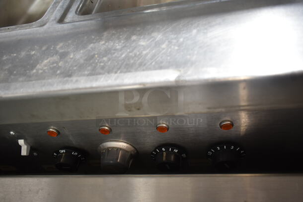 Delfield SH4-NU Stainless Steel Commercial Electric Powered 4 Bay Steam Table w/ Sneeze Guard on Commercial Casters. 120/208-240 Volts, 1 Phase.  - Image 7 of 10