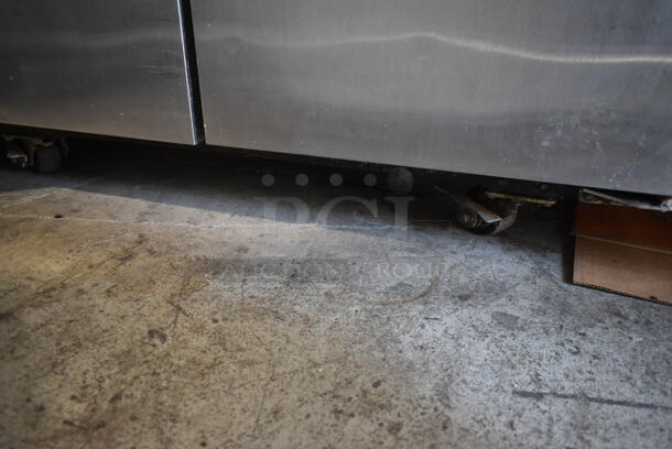 2013 True TG2R-2S ENERGY STAR Stainless Steel Commercial 2 Door Reach In Cooler w/ Poly Coated Racks on Commercial Casters. 115 Volts, 1 Phase. Tested and Working! - Image 4 of 8