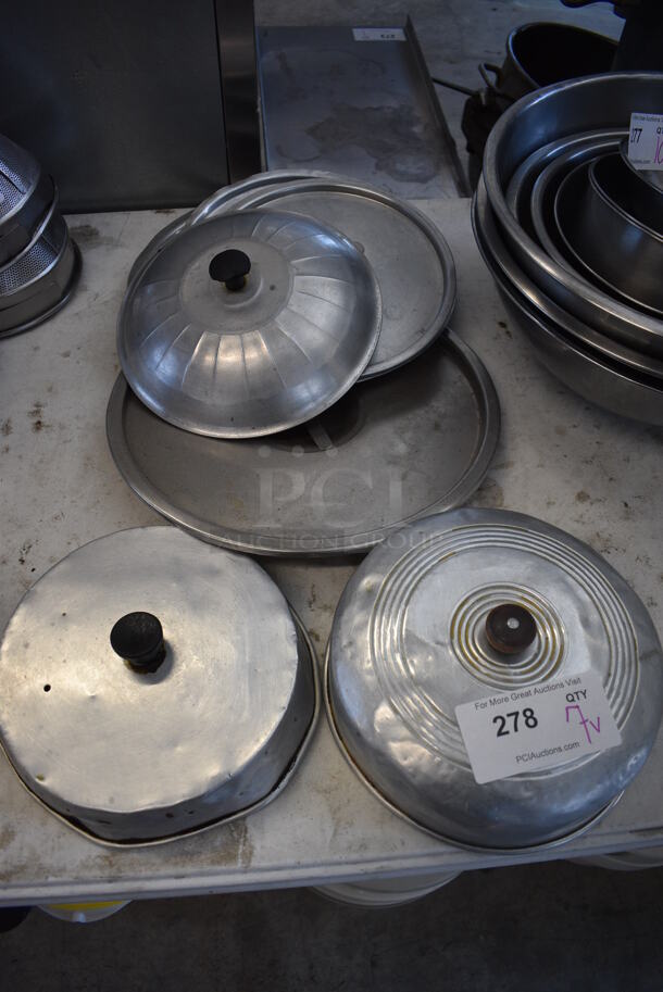 7 Various Metal Round Lids. Includes 9.5x9.5x6. 7 Times Your Bid!