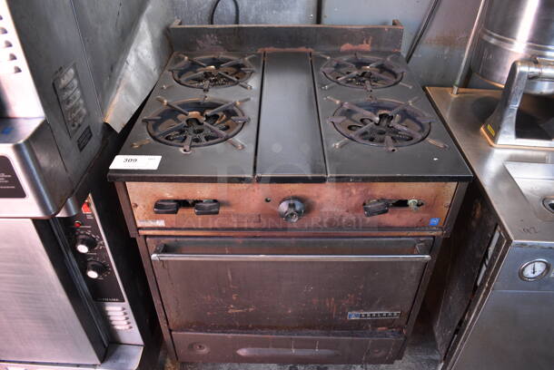 Garland Metal Commercial Propane Gas Powered 4 Burner Range w/ Oven and Gas Hose. 30x31x40.5 - Image 2 of 6