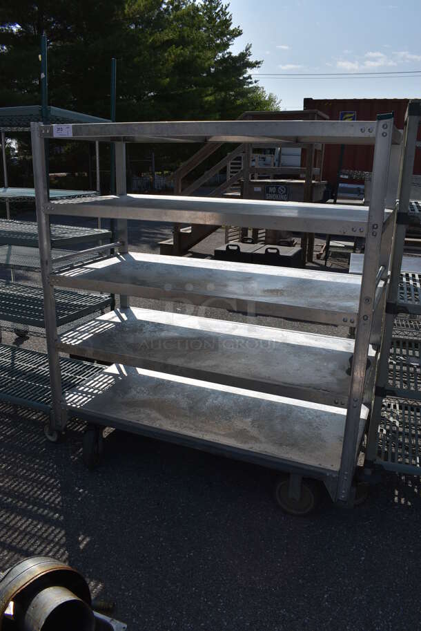 Metal 5 Tier Shelving Unit on Commercial Casters. BUYER MUST DISMANTLE. PCI CANNOT DISMANTLE FOR SHIPPING. PLEASE CONSIDER FREIGHT CHARGES. 60x27x65