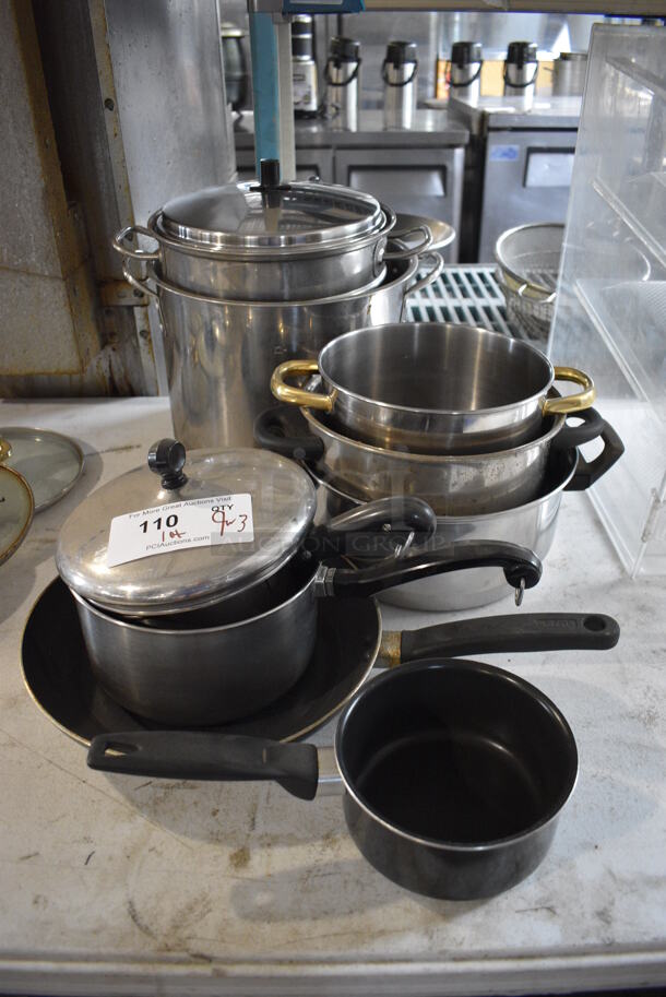 ALL ONE MONEY! Lot of 9 Various Items; Stock Pots, Sauce Pans and Skillet w/ 3 Various Lids. Includes 11.5x8x4