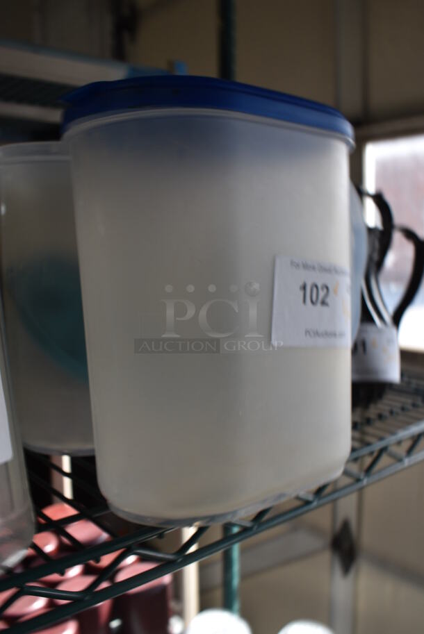 ALL ONE MONEY! Lot of 4 Clear Poly Pitchers w/ Blue Lids! 10x5x9.5 - Image 3 of 4