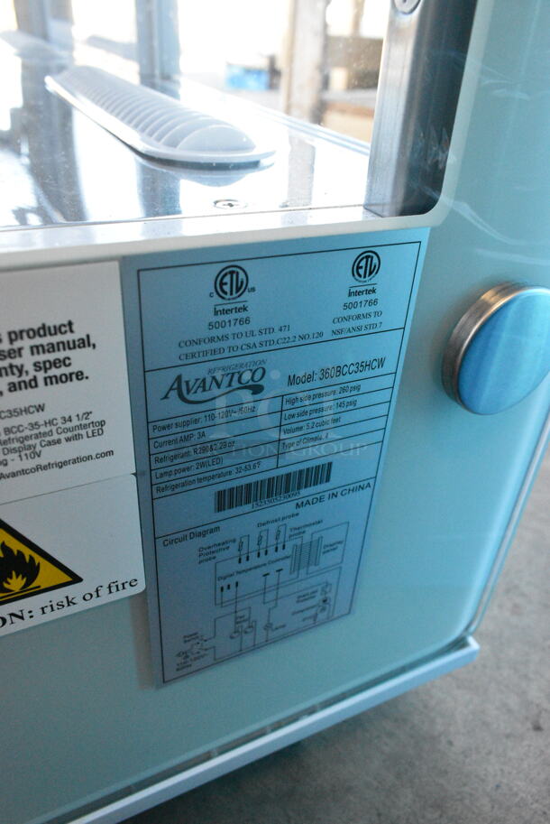 BRAND NEW SCRATCH AND DENT! Avantco 360BCC35HCW 34 1/5" White Refrigerated Countertop Bakery Display Case with LED Lighting. See Pictures for Broken Glass. 115 Volts, 1 Phase. Tested and Working! - Image 10 of 10