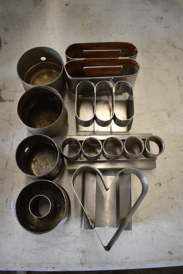 8 Various Metal Donut Cutters. Includes 5x3x2.5. 8 Times Your Bid!