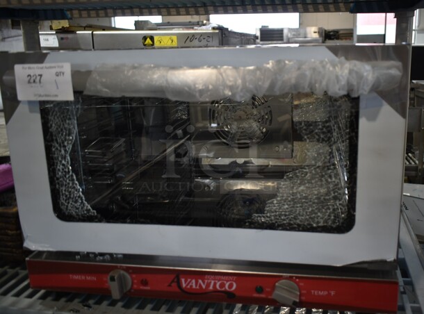 BRAND NEW SCRATCH AND DENT! Avantco 177CO16 Stainless Steel Commercial Countertop Electric Powered Half Size Convection Oven. See Glass Damage to Door. 120 Volts, 1 Phase. Tested and Working!