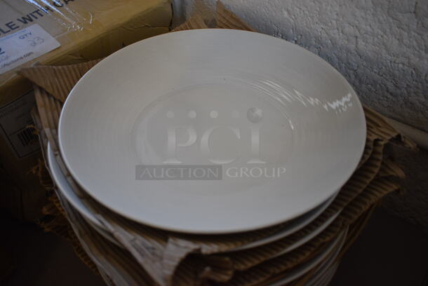 23 BRAND NEW! White Ceramic Plates. 11.5x11.5x2. 23 Times Your Bid!