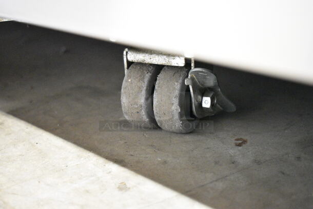 Avantco 178SSUC60RHC Stainless Steel Commercial 2 Door Undercounter Cooler on Commercial Casters. 115 Volts, 1 Phase. Tested and Powers On But Does Not Get Cold - Image 4 of 6