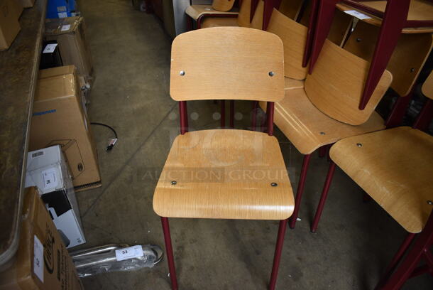 4 Wood Pattern Chairs w/ Red Metal Frame. 16x19x33. 4 Times Your Bid!