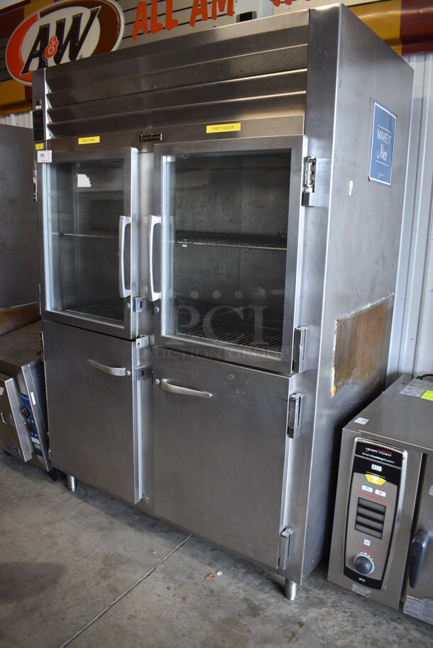 Traulsen Model RHT 2-32WUT Stainless Steel Commercial 4 Half Size Door Reach In Cooler. 115 Volts, 1 Phase. 58x36x77. Cannot Test - Unit Was Previously Hardwired