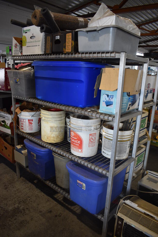 ALL ONE MONEY! Lot of Gray 4 Tier Shelving Unit w/ Contents Including Rug, Poly Bins and Metal Bins. BUYER MUST DISMANTLE. PCI CANNOT DISMANTLE FOR SHIPPING. PLEASE CONSIDER FREIGHT CHARGES. 60x18x66