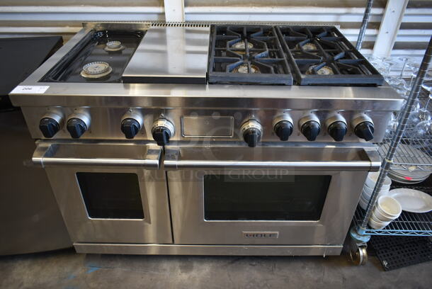 Wolf Stainless Steel Commercial Natural Gas Powered 6 Burner Range w/ 2 Ovens.