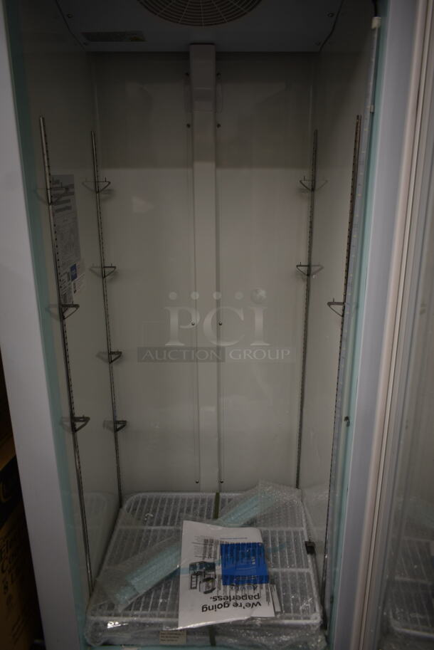 BRAND NEW SCRATCH AND DENT! 2023 Avantco 178GDC12FHCW Metal Commercial Single Door Reach In Freezer Merchandiser w/ Poly Coated Racks. 115 Volts, 1 Phase. Tested and Working! - Image 6 of 6
