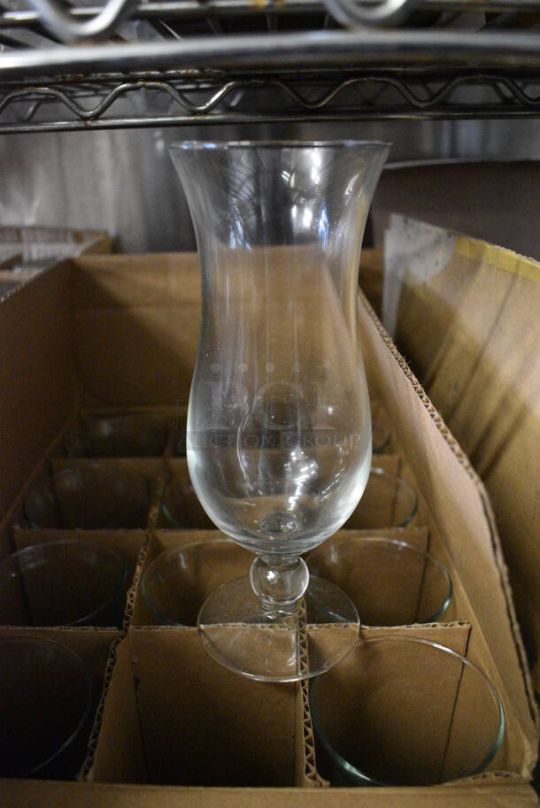 12 BRAND NEW IN BOX! Libbey Footed Squall Glasses. 3.25x3.25x8. 12 Times Your Bid!
