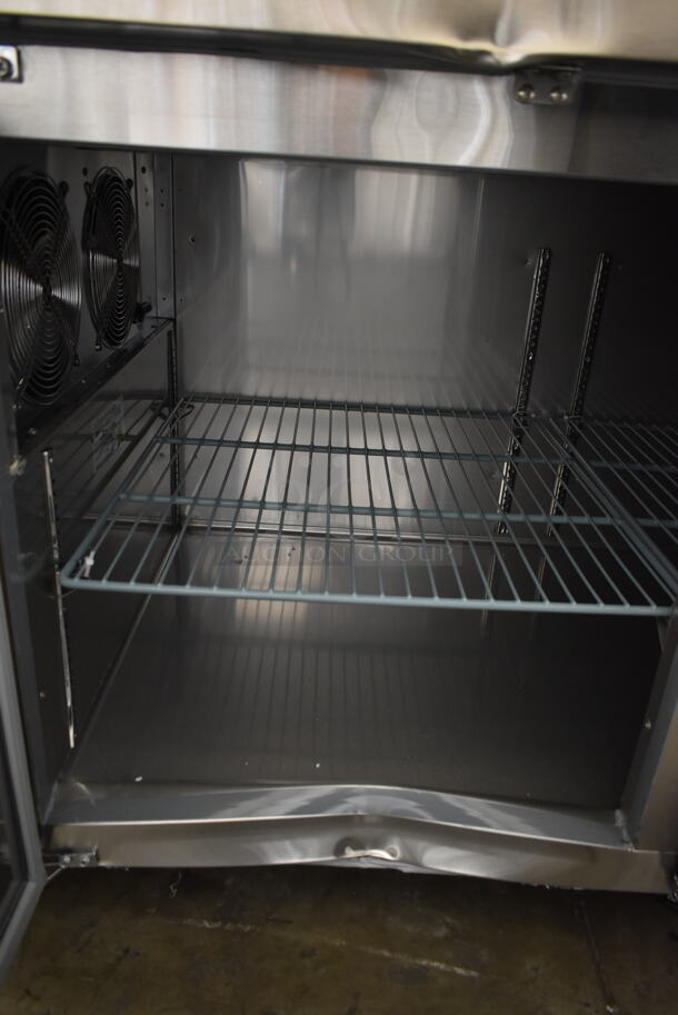 BRAND NEW SCRATCH AND DENT! 2023 Avantco 178SSPPT3 Stainless Steel Commercial Pizza Prep Table on Commercial Casters. 115 Volts, 1 Phase. Tested and Working! - Image 6 of 11