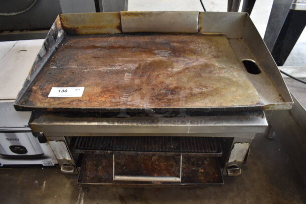 Commercial Stainless Steel Countertop Natural Gas Powered Griddle With Cheesemelter.  - Image 1 of 6