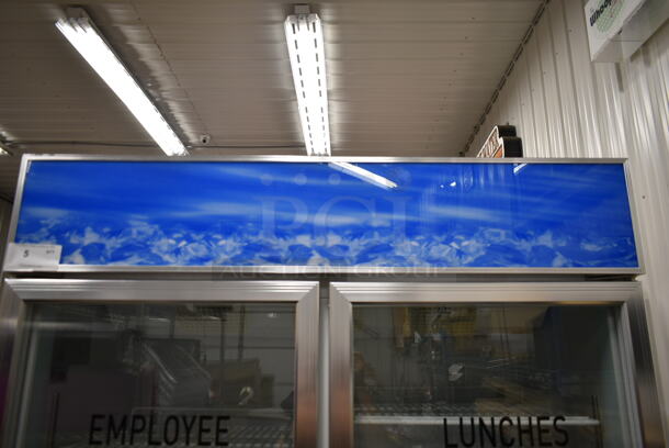 LIKE NEW! Avantco 178GDC40 Metal Commercial 2 Door Reach In Cooler Merchandiser w/ Poly Coated Racks on Commercial Casters. 115 Volts, 1 Phase. Tested and Working! - Image 2 of 10