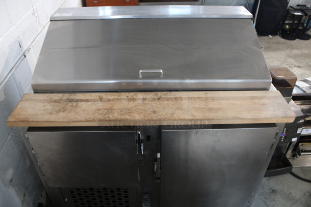 Leader Stainless Steel Commercial Sandwich Salad Make Line Prep Table Bain Marie Top w/ Butcher Block Cutting Board and Various Drop In Bins. 48x32.5x45.5. Tested and Working!