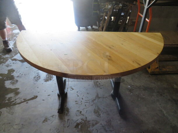 One 2 Inch Thick Solid Wooden Half Circle  Table Top On A Dual Pedestal Base. 30.5X57X30 - Image 1 of 2