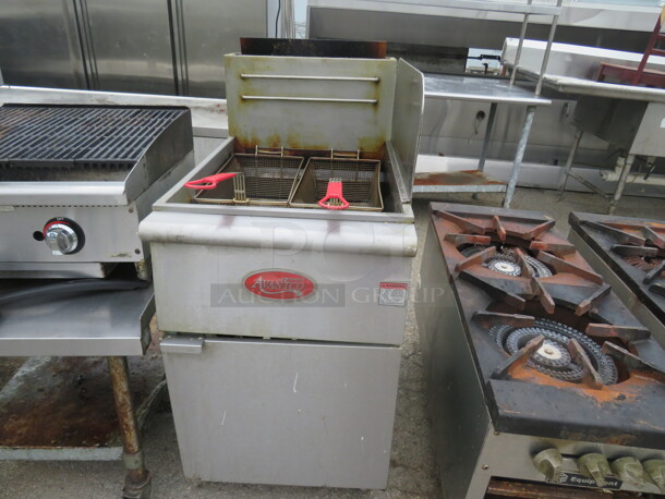 One Avantco 70-100lb Natural Gas Floor Fryer With 2 Baskets. Model# FF518-N. 21X35X47 - Image 1 of 2