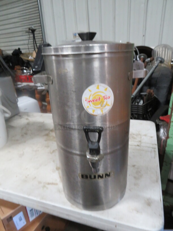 One Stainless Steel Tea Satellite With Lid And Spigot.