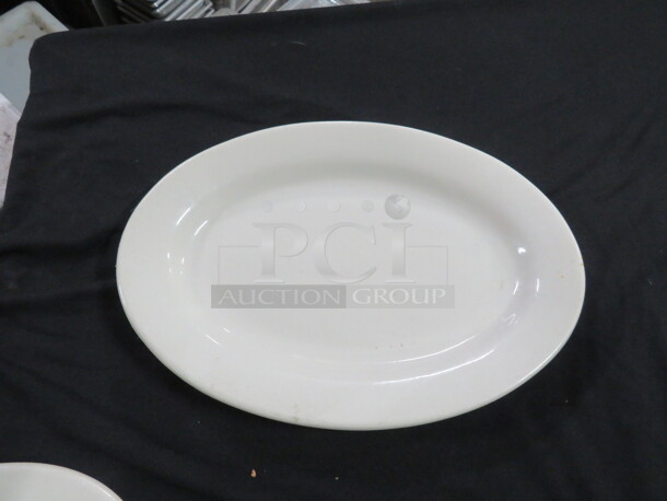 11.5 Inch  White Platter. 7XBID. - Image 1 of 2