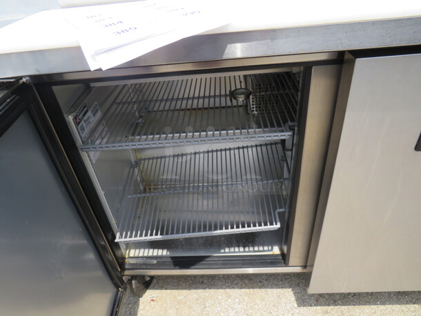 One True 2 Door Refrigerated Prep Table With Cutting Board, And 4 Racks On Casters. 115 Volt. Model# TSSU-48-12-HC. 48X30X43. $3825.00 - Image 2 of 3