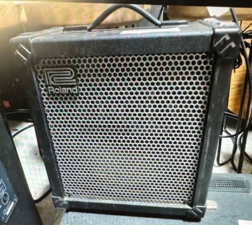 One Roland Cube 60 COSM Amplifier. 