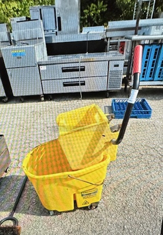 One Rubbermaid Mop Bucket And Wringer.