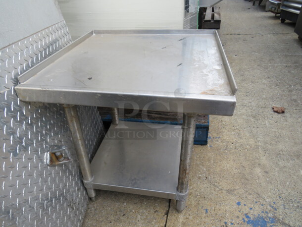 One Stainless Steel Equipment Table With SS Under Shelf. 24X24X25