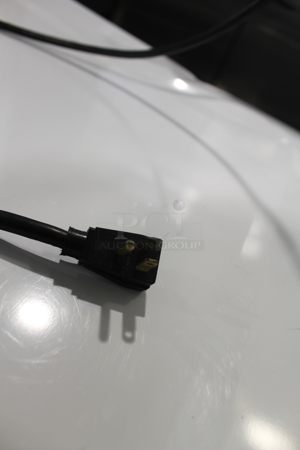 2012 True TG2R-2S ENERGY STAR Stainless Steel Commercial 2 Door Reach In Cooler w/ Poly Coated Racks on Commercial Casters. 115 Volts, 1 Phase. Tested and Powers On But Does Not Get Cold - Image 11 of 11