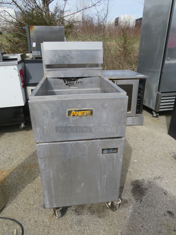 One Anets Natural Gas Deep Fryer On Casters. Model# SLG100. 20X31X46