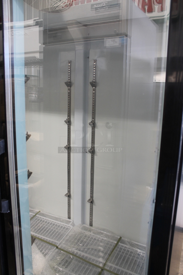 BRAND NEW SCRATCH AND DENT! Avantco 178GDC40HCB Avantco 178GDC40HCB Metal Commercial 2 Door Reach In Cooler Merchandiser w/ LED Lighting on Commercial Casters. 115 Volts, 1 Phase. Tested and Working!
 - Image 3 of 8